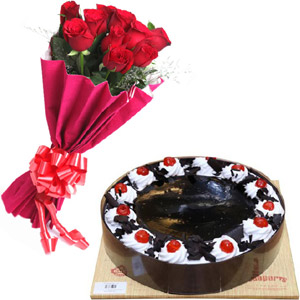 (27) Cooper's- 2.2 pound black forest cake W/ 12 pieces red roses in bouquet