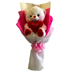  Teddy bear with red heart in a bouquet