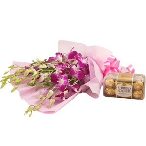 (73)  Ferrero Rocher Chocolate W/ Purple Orchids in a bouquet