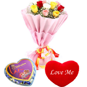Mix roses with chocolate and heart shape pillow