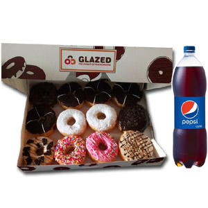 12pcs Assorted Doughnuts W/ 2 litter Pepsi. 