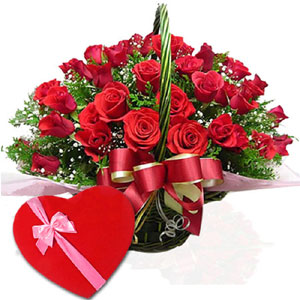 (65) 2 dozen red roses in a basket W/ Chocolates
