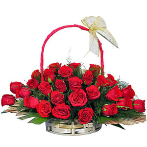 (09) 3 dozen red roses in a basket