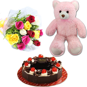 Teddy Bear, multicolored roses in a bouquet W/ Black forest cake 
