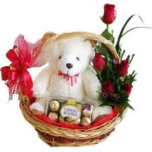 Small size Bear W/Ferrero Rocher Chocolate & Red roses in a basket.