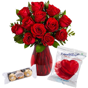 Roses with candy and chocolate