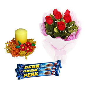 Chocolates W/ red roses & candles