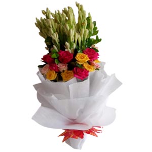 Mixed roses & Rajanigandha in a bouquet